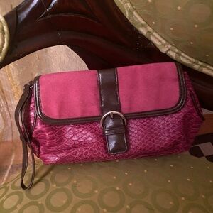 Red animal looking print Elizabeth Arden wristlet